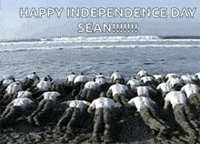 a group of soldiers are doing push ups on the beach and the caption says happy independence day sean