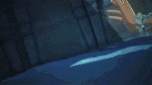 a close up of a person 's arm with a green object in the background