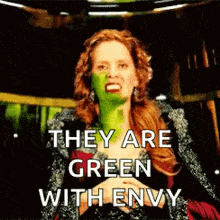 a woman with a green mask on her face is saying they are green with envy