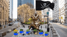 a statue of a gorilla riding a bull is surrounded by a band of peeps
