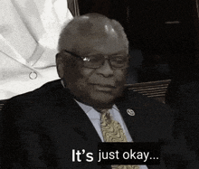 a man in a suit and tie says it 's just okay ..