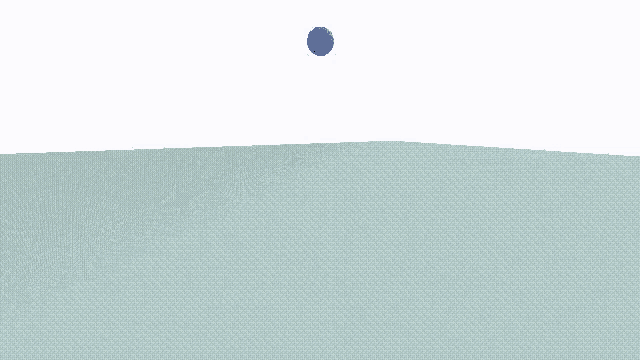 a blue ball is flying in the air over a plain .