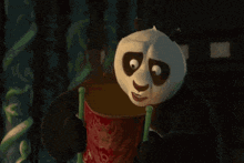 a panda bear says " it 's " in front of him