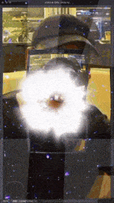 a computer screen shows a person taking a picture of themselves