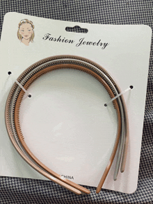 a package of fashion jewelry with three headbands in it