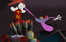 a tnt sign is painted on a wall above a bunch of bombs
