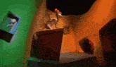 a cat in the hat is standing on a box in a room