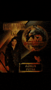a man in a suit stands in front of a logo that says admin putra