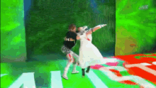 a woman in a white dress is dancing with a man in a black shirt that says " i love you "