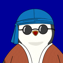 a penguin wearing a blue hat and sunglasses