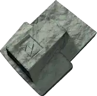 a piece of stone with the letter a and z carved into it