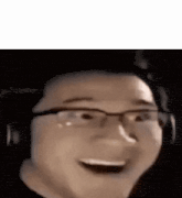 a close up of a person wearing glasses and headphones making a funny face .