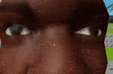 a computer generated image of a man 's face with a cursor pointing to the nose