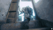 a person is walking up a set of stairs with a watermark that says ' nb ' on it