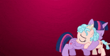 a couple of ponies are hugging each other with hearts in the background