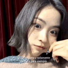 ryujin de dana y solamente de dana para siempre is written below a woman 's face