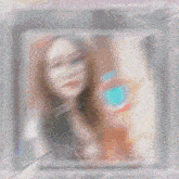a woman with glasses is holding a heart shaped object