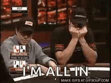 two men are playing poker and one of them is saying `` i 'm all in '' while sitting at a table .