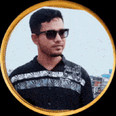 a man wearing sunglasses and a shirt that says zinc plus edition c-63