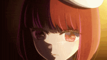 a close up of a girl with red hair wearing a hat