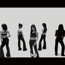 a black and white photo of a group of women with the letters ms on the bottom right