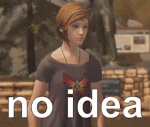 a woman wearing a shirt with a butterfly on it is standing in front of a sign that says no idea