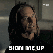 a man with long hair says " sign me up " in front of a max logo