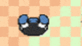 a pixel art of a bird on a checkered background