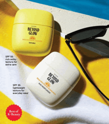 two bottles of avon beyond glow sun moisturizers