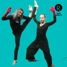 a man and a woman are dancing in front of a blue background with the letter r on it