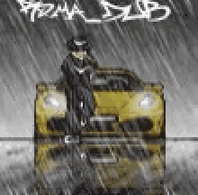 a man is driving a yellow car in the rain .