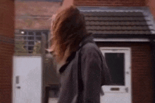 Carla Walks By While Flipping Her Hair Coronation Street GIF