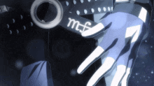 a close up of a person 's hand with a belt that says mf