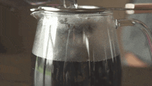 Straining The Water Two Plaid Aprons GIF - Straining The Water Two Plaid Aprons Transferring The Water GIFs