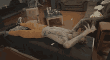 a man laying on a bed with a tattoo on his chest that says tcp