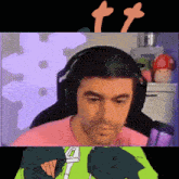 a man wearing headphones and a pink shirt is shown in a cartoon