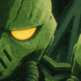 a green robot with a yellow eye is looking at the camera