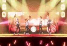 a group of men are dancing on a stage with fans