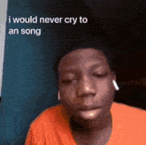 a young man wearing an orange shirt says he would never cry to a song