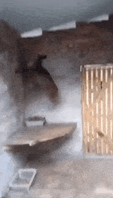 a room with a wooden fence and a shelf