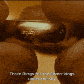 a close up of a ring that says three rings for the elven kings under the sky