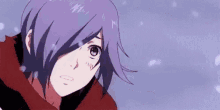 a close up of a person 's face with purple hair in the snow .
