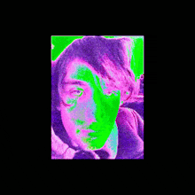 a purple and green image of a person with a black background