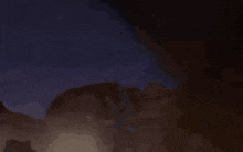 a pixelated image of a person 's face with a purple light coming out of it