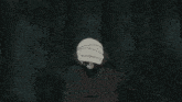 a couple of anime characters are standing next to each other and one of them has red eyes .