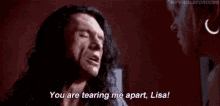 a man is crying and saying `` you are tearing me apart , lisa! ''