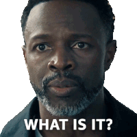 a man with a beard has the words what is it on his face