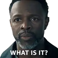 a man with a beard has the words what is it on his face