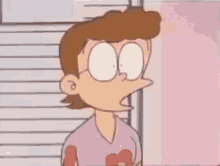 a cartoon character with a red face and a pink shirt with a heart on it .