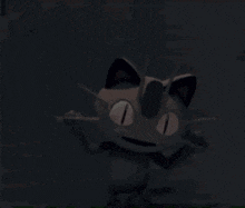 a cat with sharp teeth is standing in the dark and smiling .